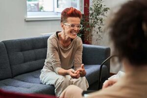 a person talks to a therapist in a transitional living program in nashville 